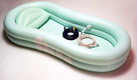 Inflatable bathtub with accessories